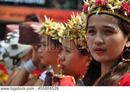 Jakarta, Indonesia - April 28, 2013 : Dayak Women From Borneo, Kalimantan, Wear Traditional Clothes 