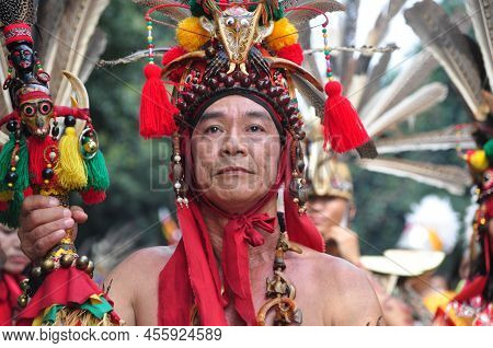 Jakarta, Indonesia - April 28, 2013 : An Old Man From The Dayak Tribe Wears Traditional Dayak Clothi