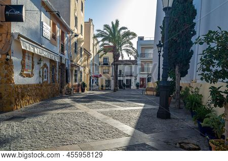 Calpe, Spain - January 26, 2022: View Of Colorful Buildings And Narrow Streets, Architecture In The