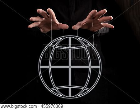Global Manipulation. Hands Holding Earth By Strings. Government, Press Trying To Exert Influence On 
