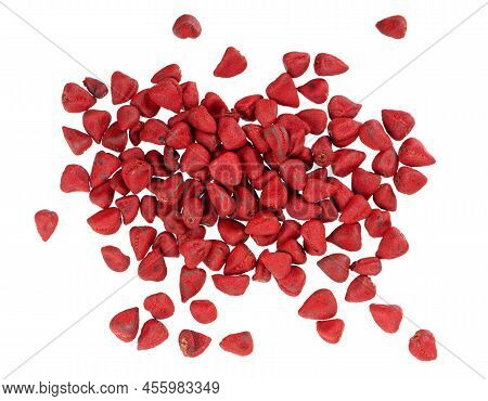 Annatto Seeds, Isolated On A White Background. Achiote Seeds, Bixa Orellana. Natural Dye For Cooking