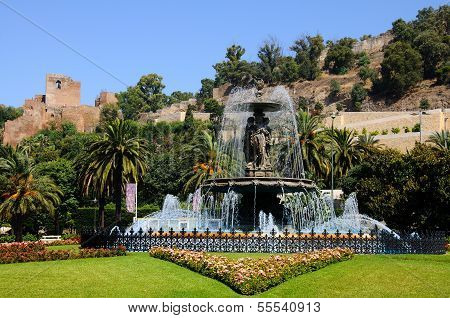 Fountain with castle to rear, Malaga.