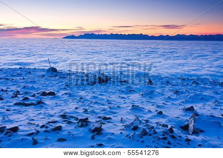 Landscape Winter Hill Scene With Fog.