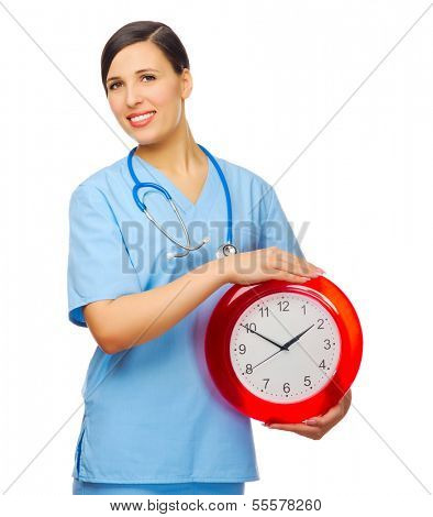 Young doctor with clock isolated
