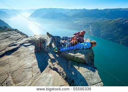 Happy Family On  Preikestolen Massive Cliff Top (norway)