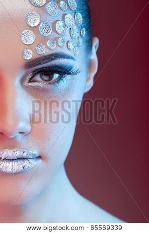 Beautiful Woman With Art Make Up And Rhinestone