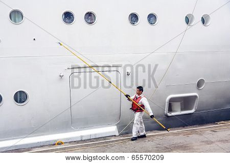 Worker Renovate The Ship's Side