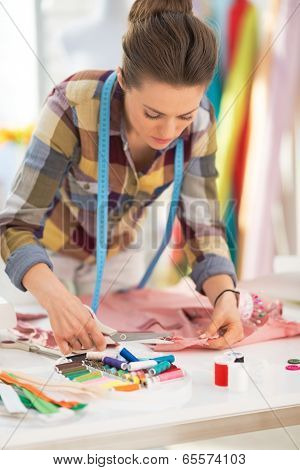Seamstress Working With Garment
