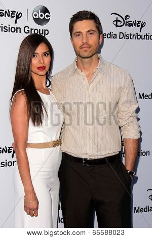 LOS ANGELES - MAY 19:  Eric Winter, Roselyn Sanchez at the Disney Media Networks International Upfronts at Walt Disney Studios on May 19, 2013 in Burbank, CA