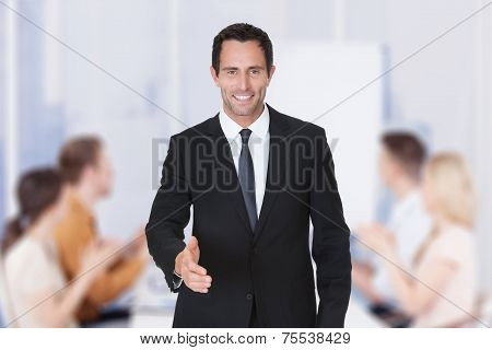 Portrait Of Happy Middle Aged Businessman