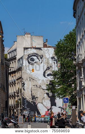 Graffiti On The Wall Of A House In Paris.