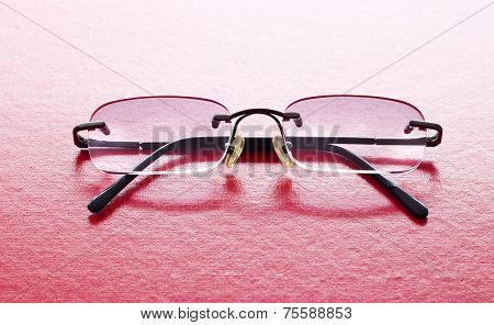 Glasses On Pink Background