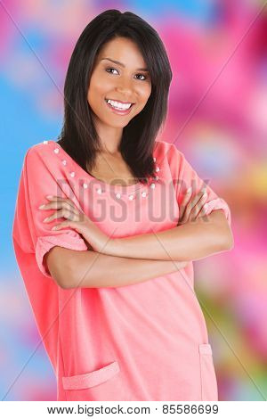 Happy tanned woman looking at the camera