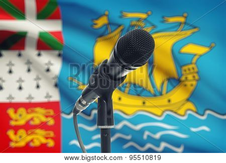 Microphone On Stand With National Flag On Background - Saint-pierre And Miquelon