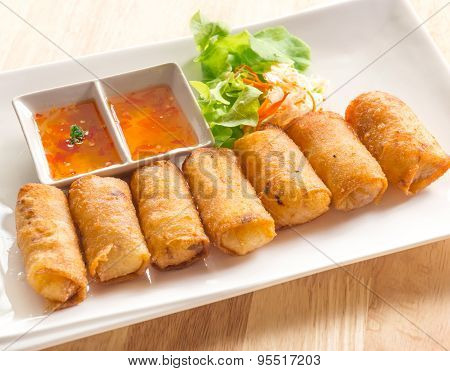 Fried Thai Traditional Spring Rolls Food On White Dish