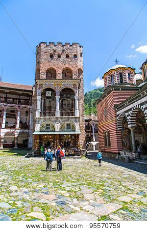 Tourists Near The Icon Shop In Famous Rila Monastery, Bulgaria