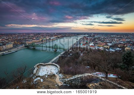 Budapest Hungary - Beautiful sunset over the city of Budapest with River Danube Szabadsag Bridge and Gellert Bath taken from Gellert Hill