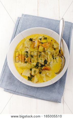 scottish fish soup with potatoes parsley and smoked haddock