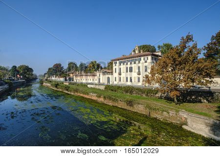 Cassinetta di Lugagnano (Milan Lombardy Italy): facade of the historic Villa Visconti Maineri along the canal known as Naviglio Grande of Turbigo