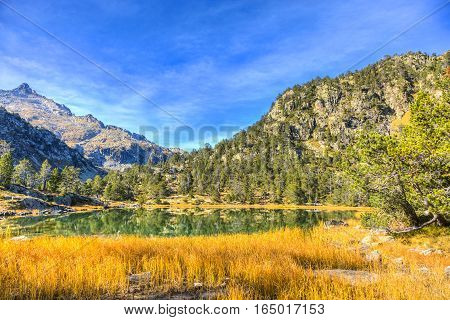 Beautiful high altitude lake (les Laquettes) located in Pyrenees Mountains in Neouvielle Massif.
