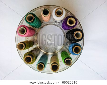 High angle view of multi coloured thread.