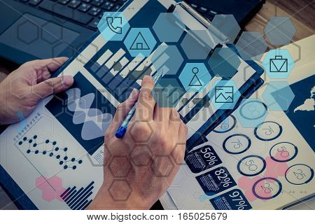 Business Workers Discussing Digital Graphs And Diagrams Indicating Progres