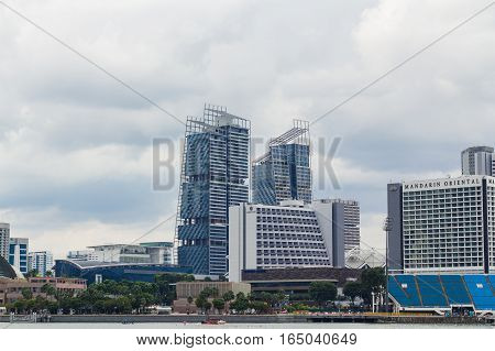 Singapore - December 17 2016: Modern Building and Mandarin Oriental Hotel located in Marina Bay Area.
