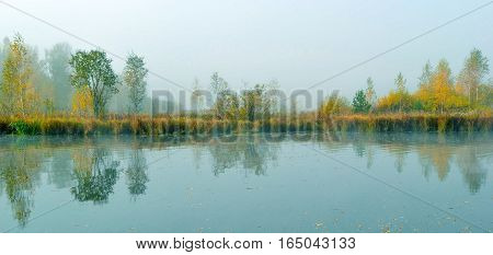 The fog in the morning at the lake.
