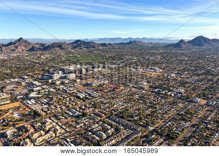Morning sun on the desert landscape of Phoenix Arizona near the Camelback corridor viewed from above