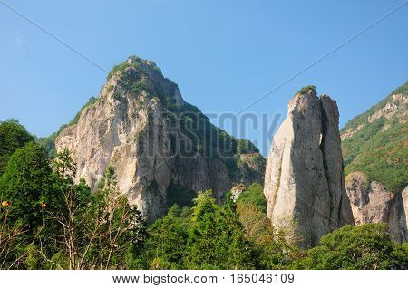 Scissors Peak shaped rocks rising up from the ground at the Dalong Waterfall scenic area in Yandangshan mountain area located in Zhejiang province China.