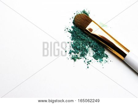 Makeup highlighter, make-up on Valentine's Day, shadow and brushes for make-up, make-up artist for the tools.