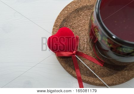 kissel in mug with red velvet heart