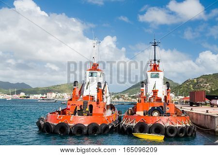 Two Orange Tugboats in St Maartin harbor
