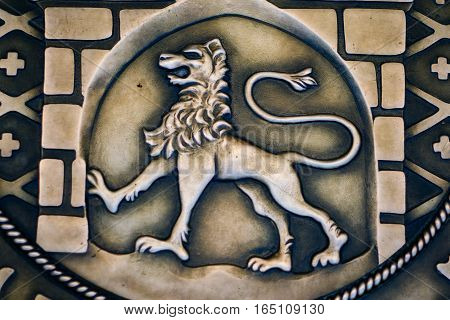 Vintage image of a lion on the metal