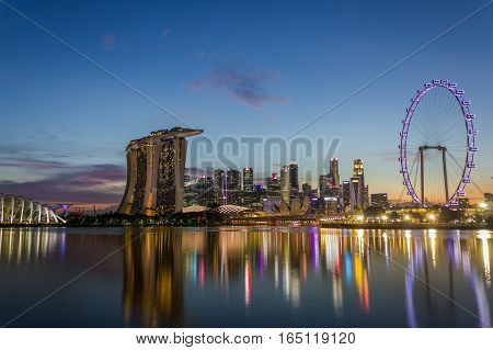 Singapore - January 7 2017: Urban Skyline and View of Skyscrapers at Sunset time in Singapore Dusk Landscape Waterfront