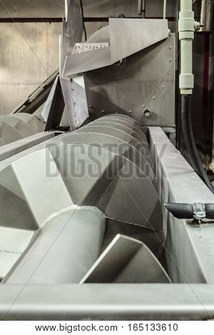 Screw in the slaughterhouse of poultry production line