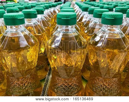 Closed up pile of bottled palm oil in the market