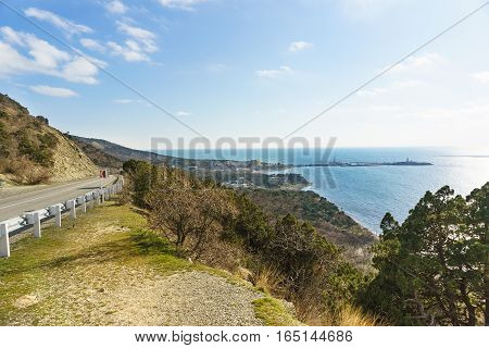 The road to the city on the mountain slopes above the sea. Russia Krasnodar Krai village of Big Utrish
