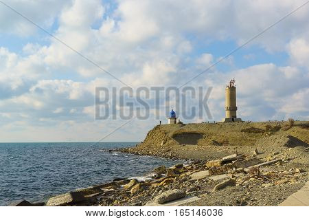 The lighthouse at Cape Utrish Dolphinarium in the Black sea. Russia Krasnodar Krai village of Big Utrish