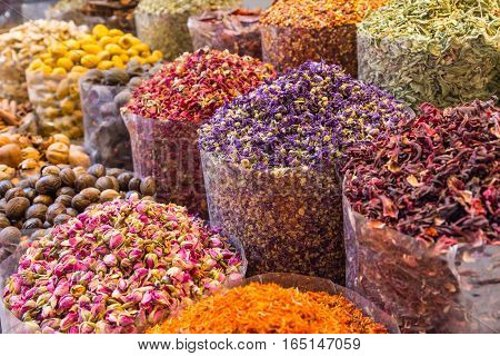 Spices and herbs being sold on street stal at Morocco traditional market.