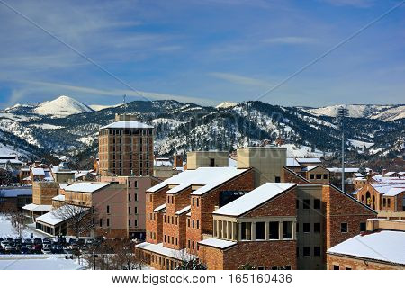 The University of Colorado Boulder Campus on a Snowy Winter Day with the Rocky Mountains in the Background