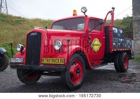 SAINT PETERSBURG, RUSSIA - SEPTEMBER 04, 2016: The automobile tow truck on the basis of the German Opel Blitz truck. Festival of retro transport in Kronstadt