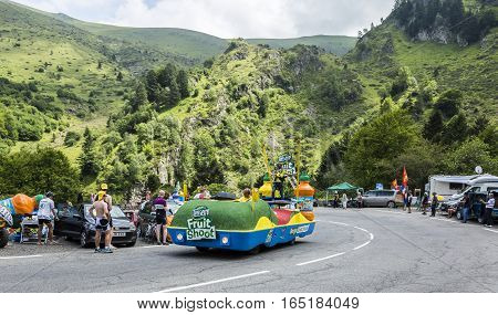 Col du Tourmalet, France - July 24, 2014: Teisseire truck during the passing of the publicity caravan on the road to Col de Tourmalet in the stage 18 of Le Tour de France 2014.
