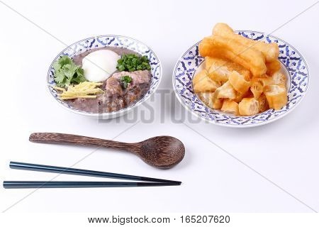 Red Brown Rice , Porridge With Mined Pork And Chicken Lever .