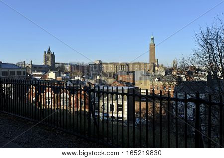 The city of Norwich Norfolk UK view from Norwich Castle with a skyline which includes City Hall and the church of St Peter Mancroft.