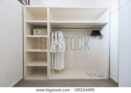 Bathrope, safe box and cloth hanger in wardrope.