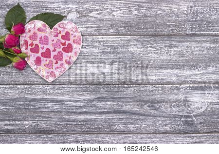 Valentines day background card with pink roses on gray wooden background. Love. Wedding.