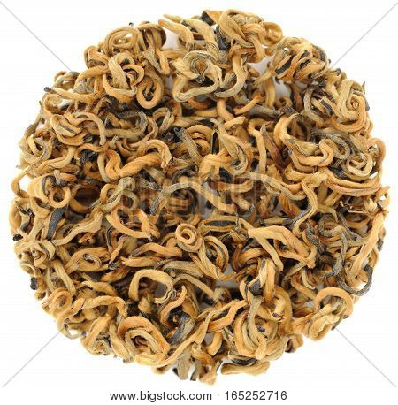 Yunnan Mojiang chinese black tea in round shape isolated closeup