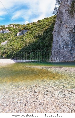 The river L'Ibie in the Ardeche region of France on a sunny day.