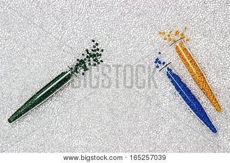 Polymeric dye. Plastic pellets. Colorant for plastics. Pigment in the granules.